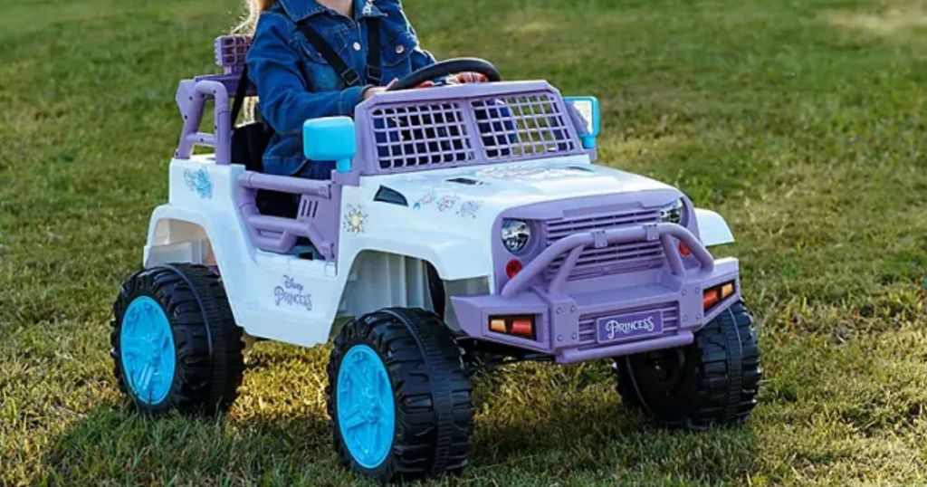 little girl riding in a Disney Princess SUV Ride-On Toy