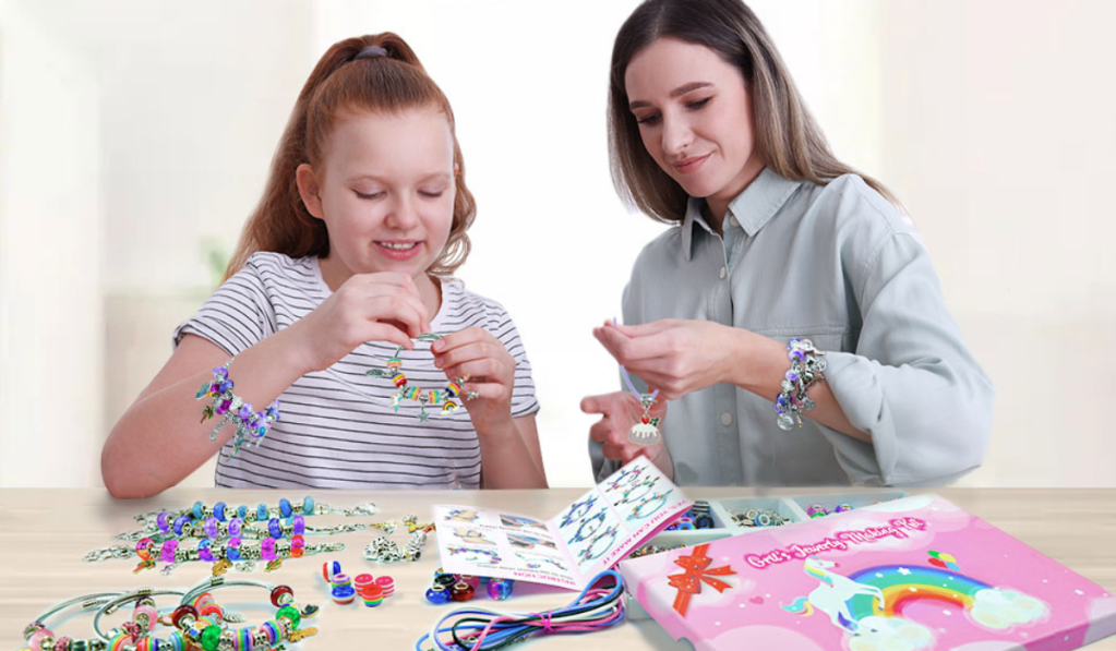 girl and mom making bracelets together using the Gionlion Charm Bracelet Making Kit