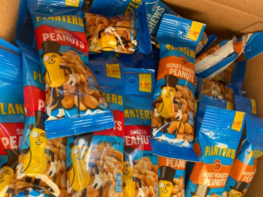 individual packs of different flavors of Planters Peanuts in a box