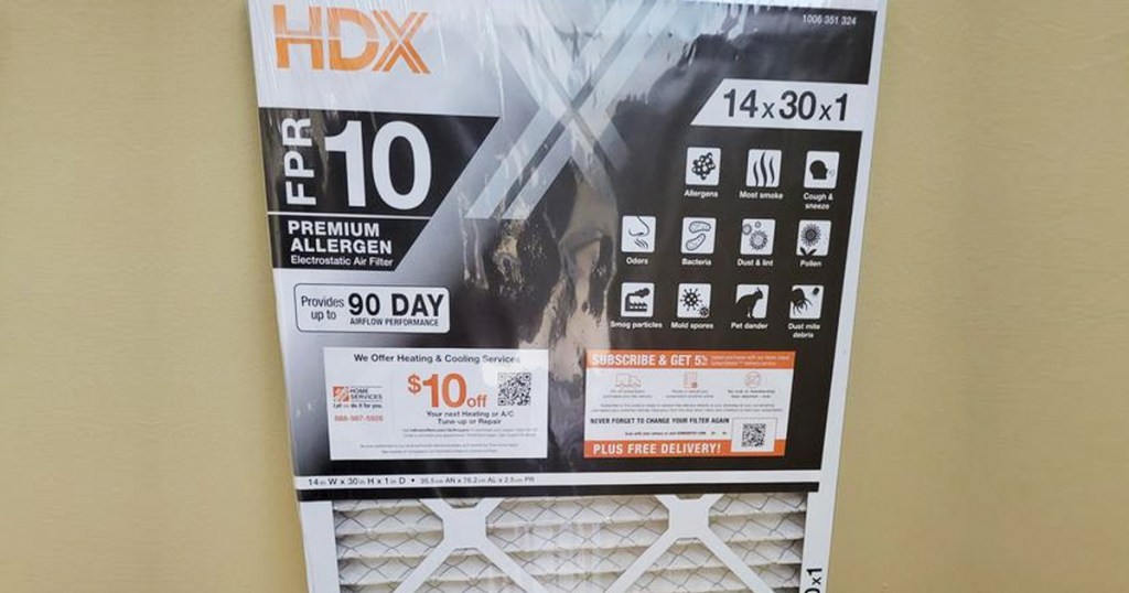hdx air filter leaning against wall