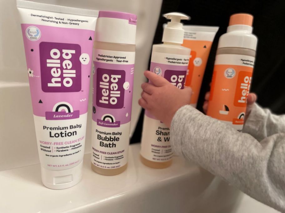 baby's hand reaching for Hello Bello Bath Products
