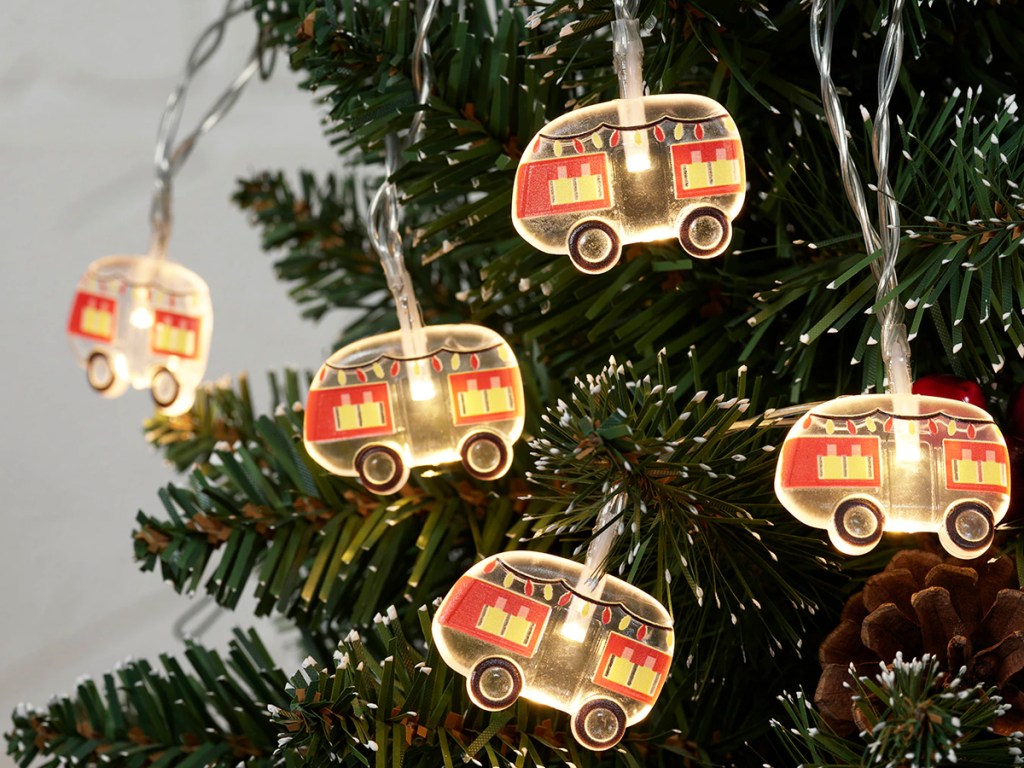 camper shaped string lights on christmas tree