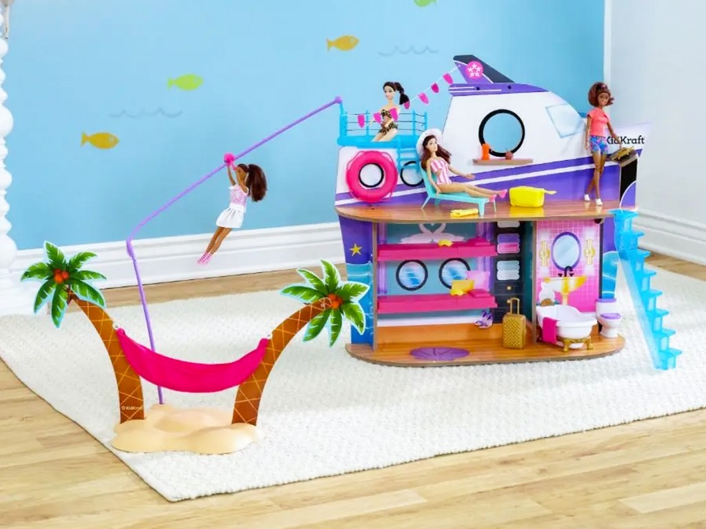 cruise ship themed dollhouse with doll zip-lining to island