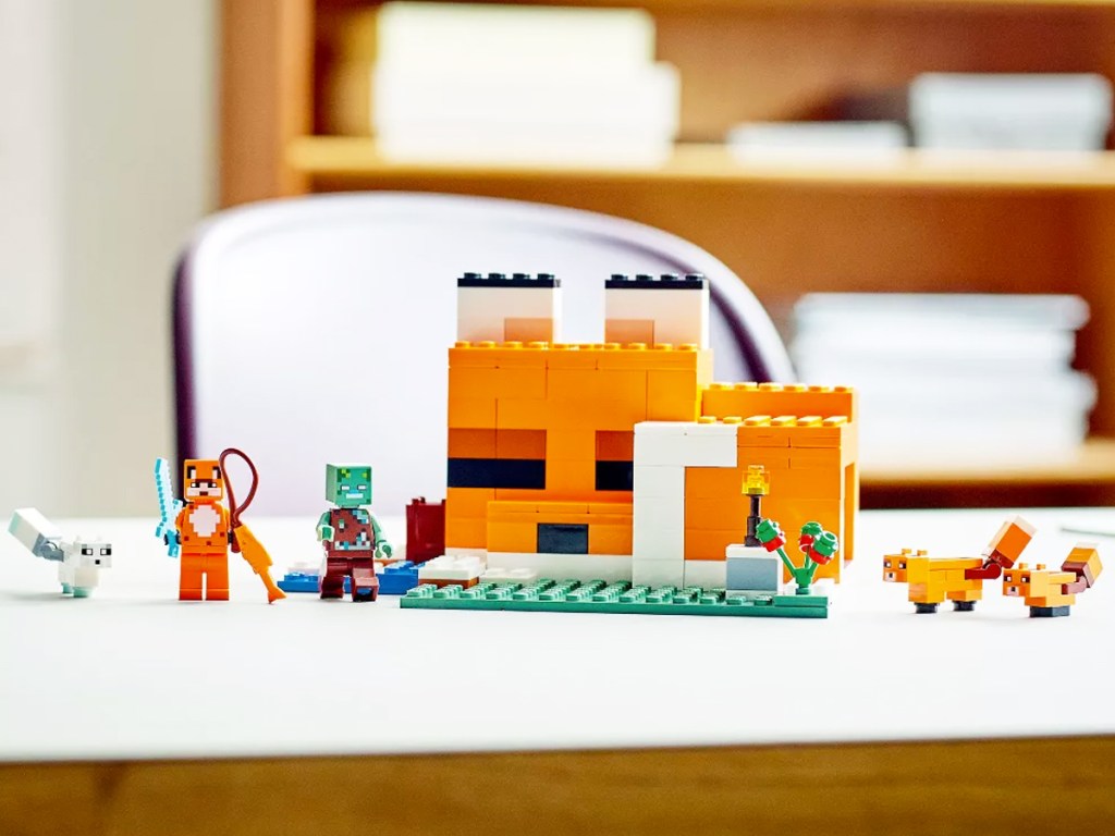lego minecraft fox lodge house set on white table