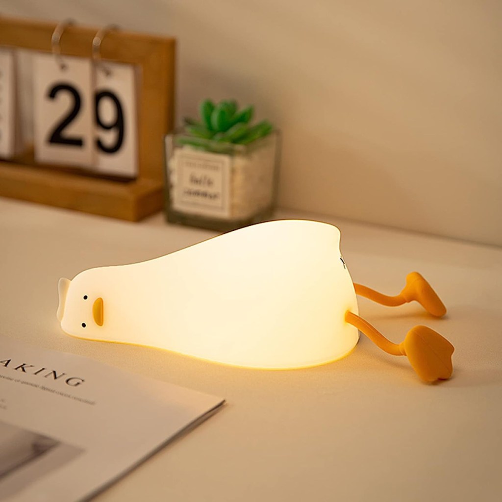 A duck nightlight that lies on its side makes a unique gift for the nursery or a funny white elephant gift