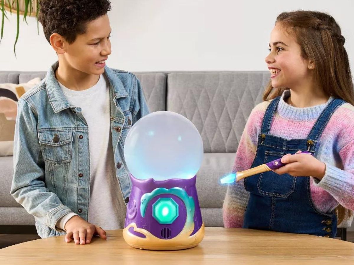 boy and girl playing with Magic Mixies Crystal Ball