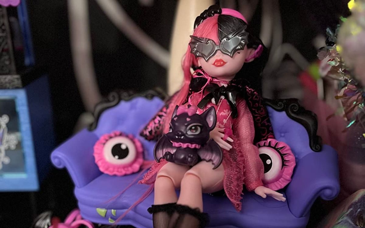 Monster High Draculaura Doll sitting on a couch