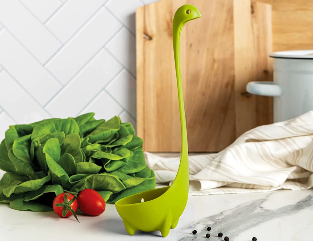 green nessie ladle on kitchen counter