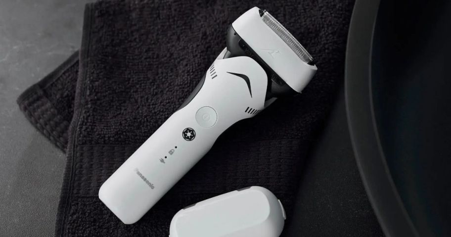 A white Panasonic Star Wars Stormtrooper Electric Razor on a black towel