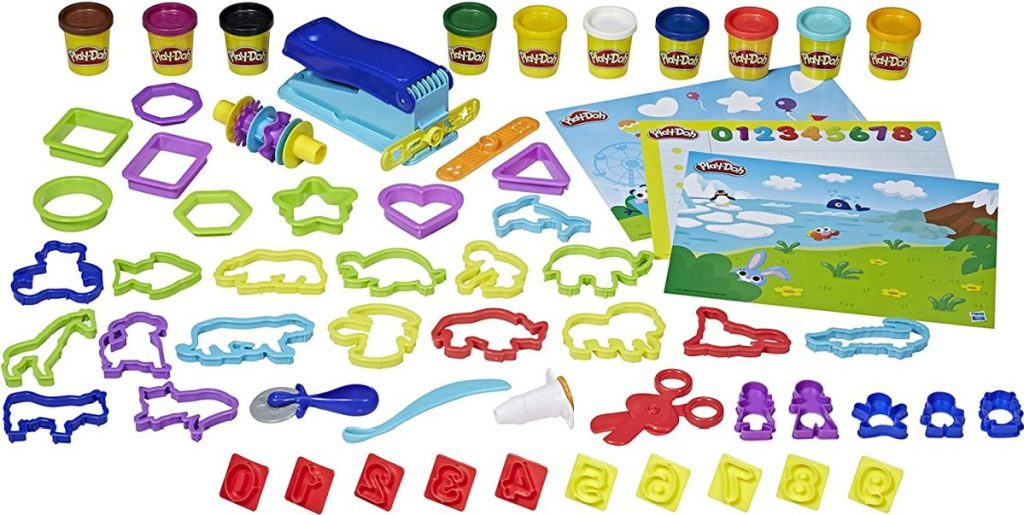 hugeplay-doh set with the Fun Factory, tools, playmats, and cans of Play-Doh compound.