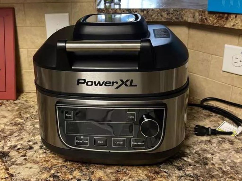 A PowerXL Grill Air Fryer Combo on a kitchen counter 