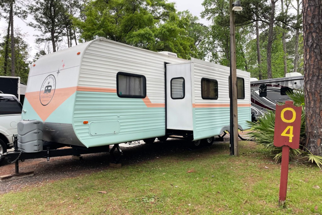 An RV Rental from RVShare parked at a KOA campground