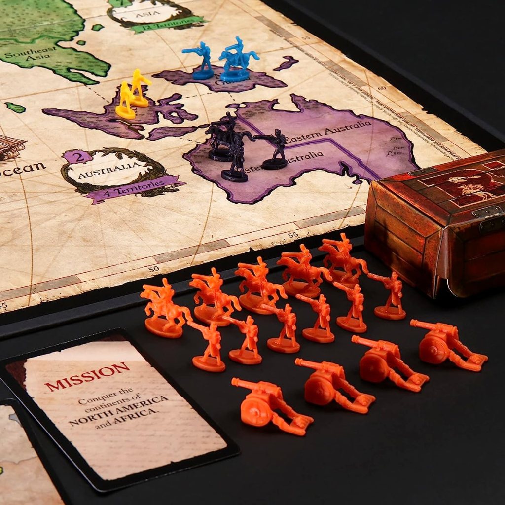 Risk board game pieces and cards next to the board
