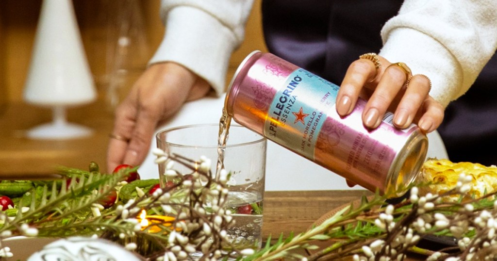 pouring a can of S.Pellegrino Essenza