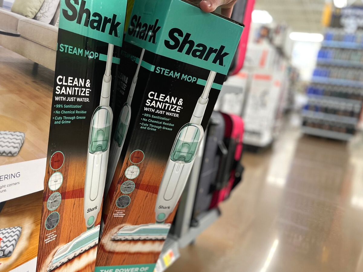 taking Shark Steam Mop off shelf at store