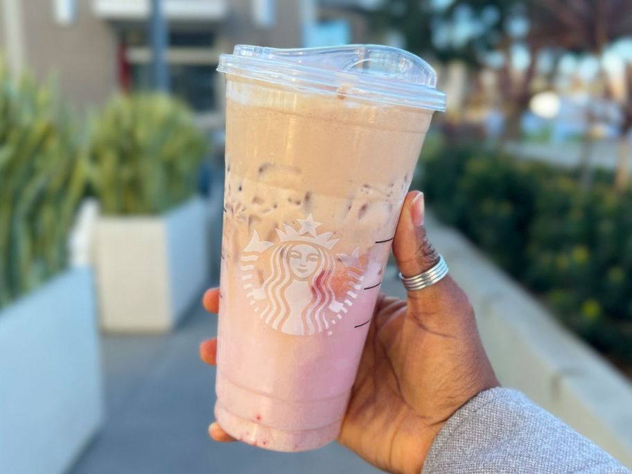hand holding up a Starbucks Pink with a Wink drink