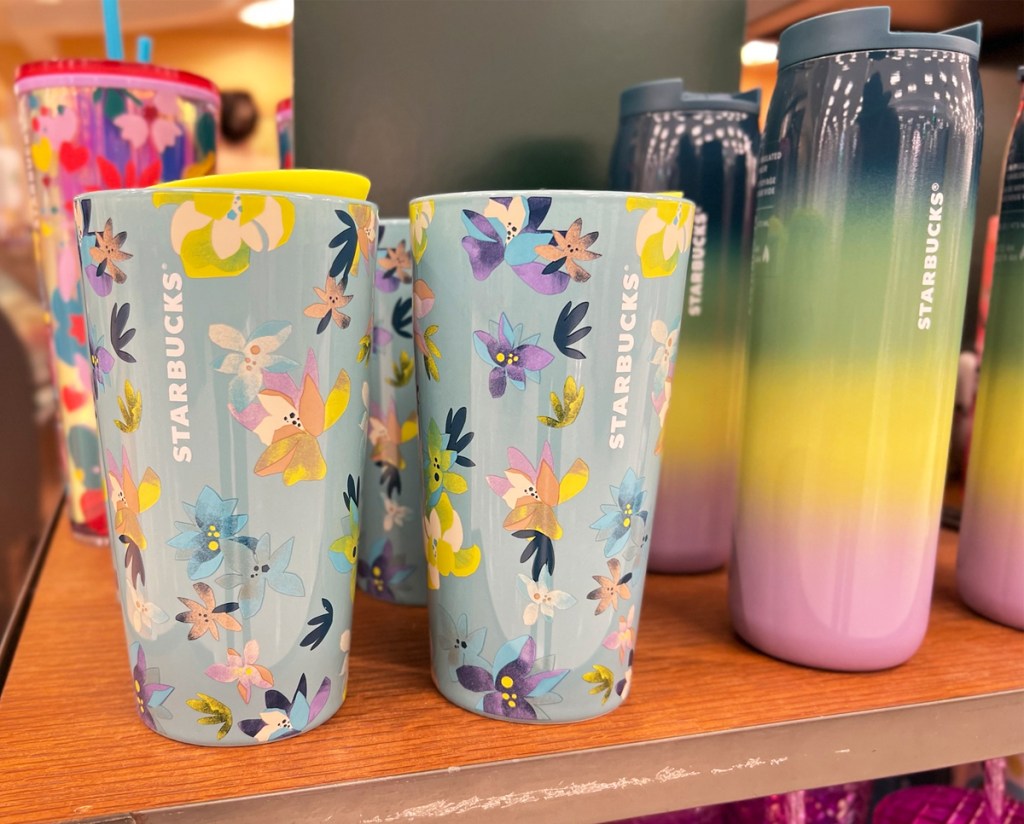 floral and rainbow print tumblers