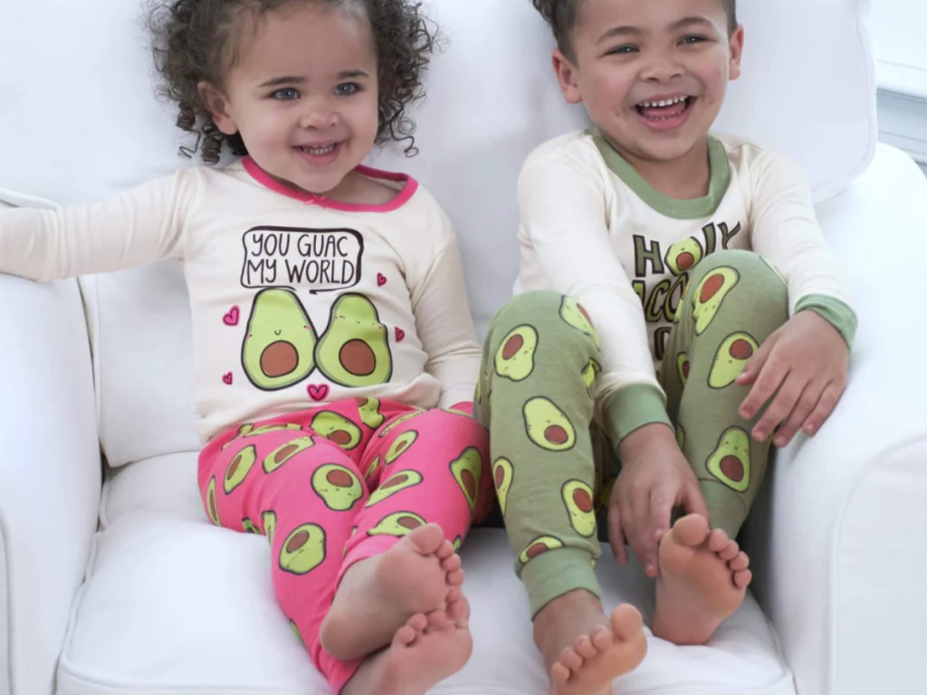boy and girl toddlers wearing avocado pajama sets