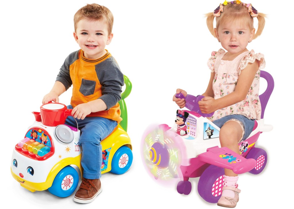two toddlers on ride on toys