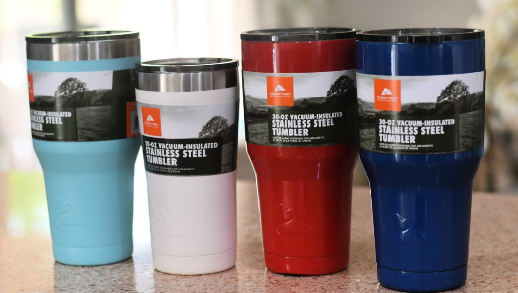 four tumblers on a kitchen counter