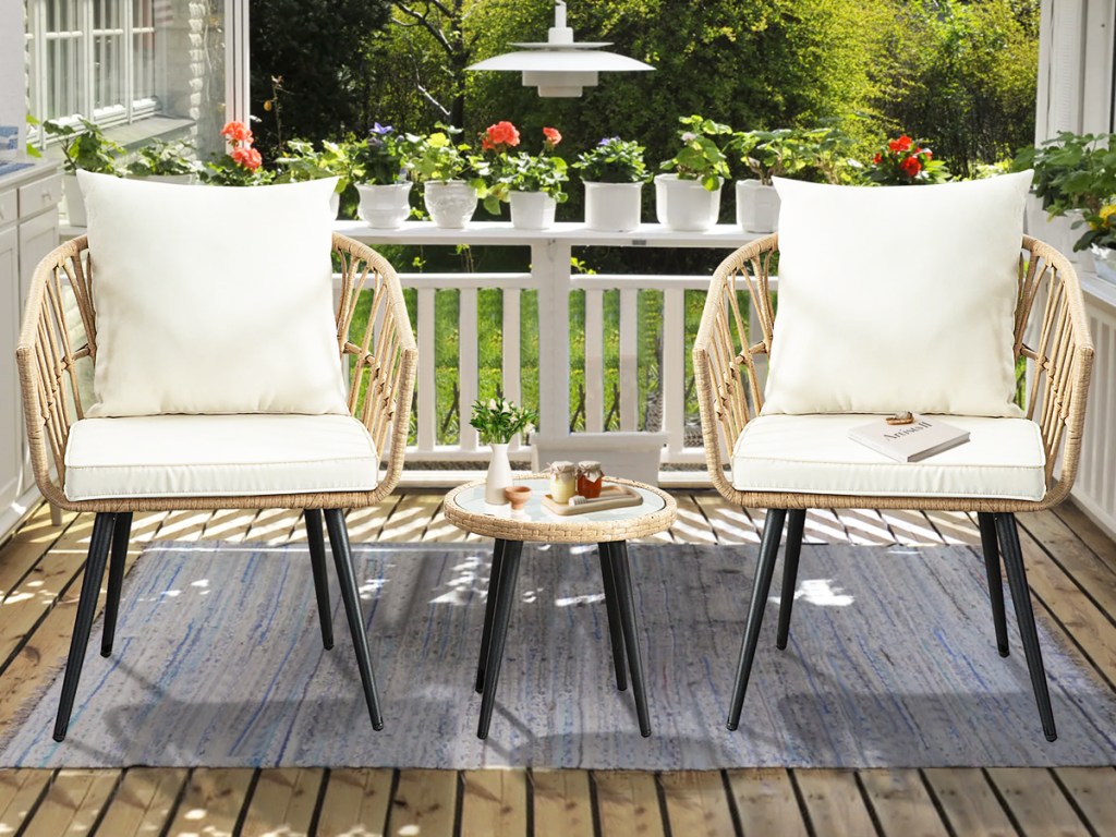 3 piece wicker patio set on outdoor area rug