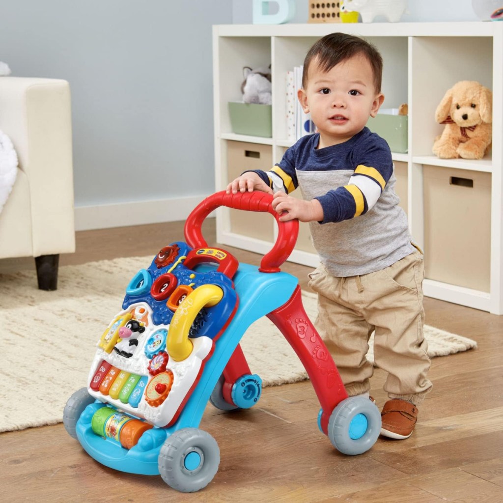 a toddler using the vtech sit to stand learning walker which is on Amazon's Toys We Love List