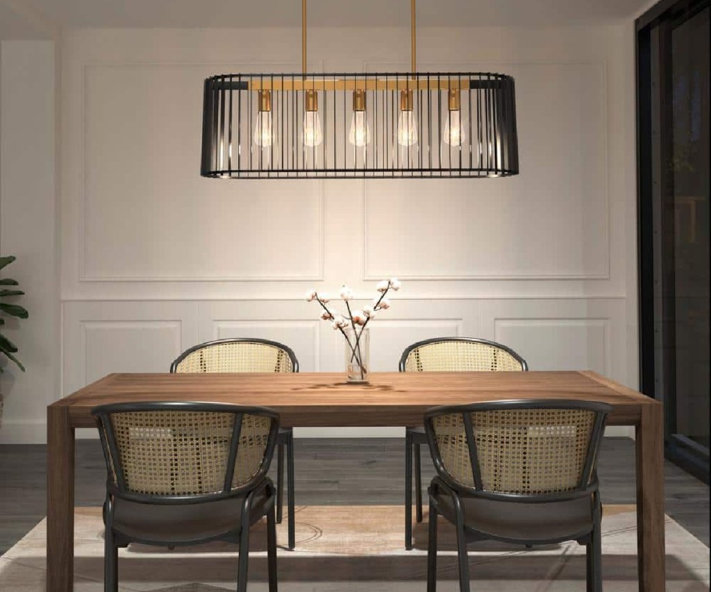 artika island Chandelier over a dining table