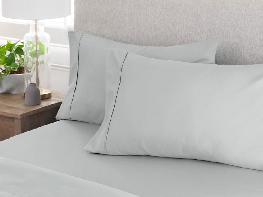 bed with pillows and Member's Mark 450-Thread Count Solid Sheet Sets in Twin_Twin XL