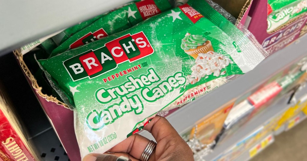 hand holding brachs crushed candy canes candy bag 