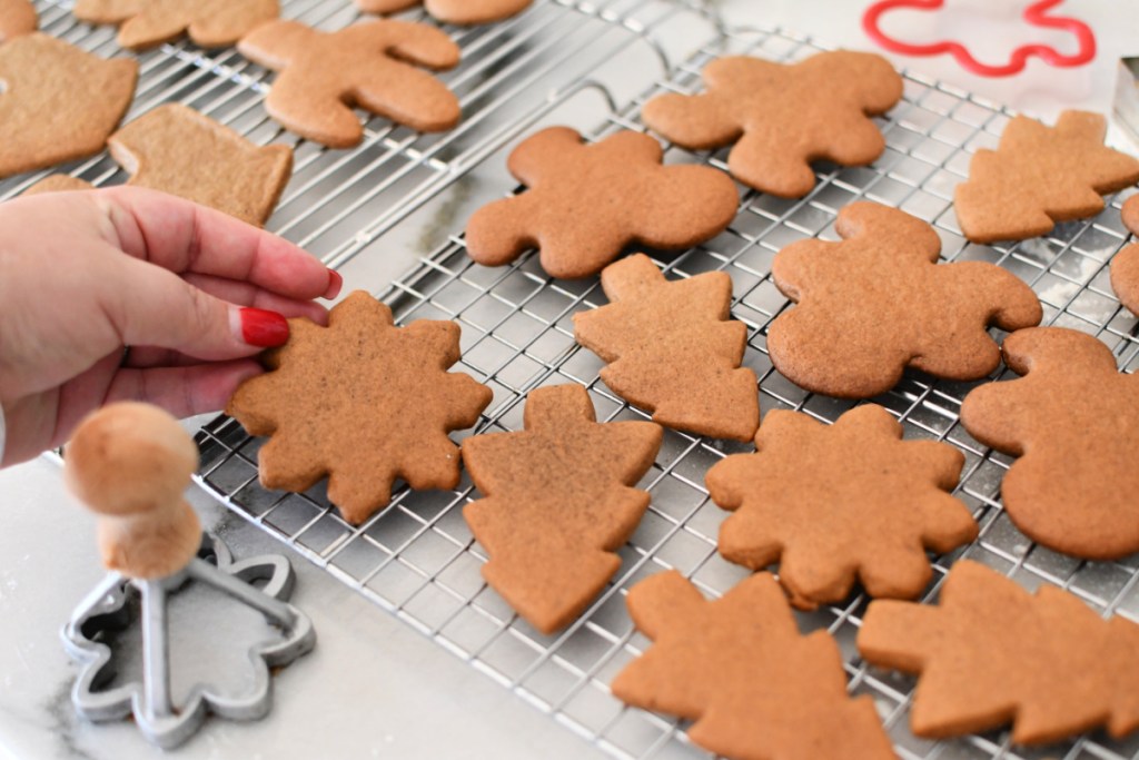 cut out gingerbread cookies on cooling rack