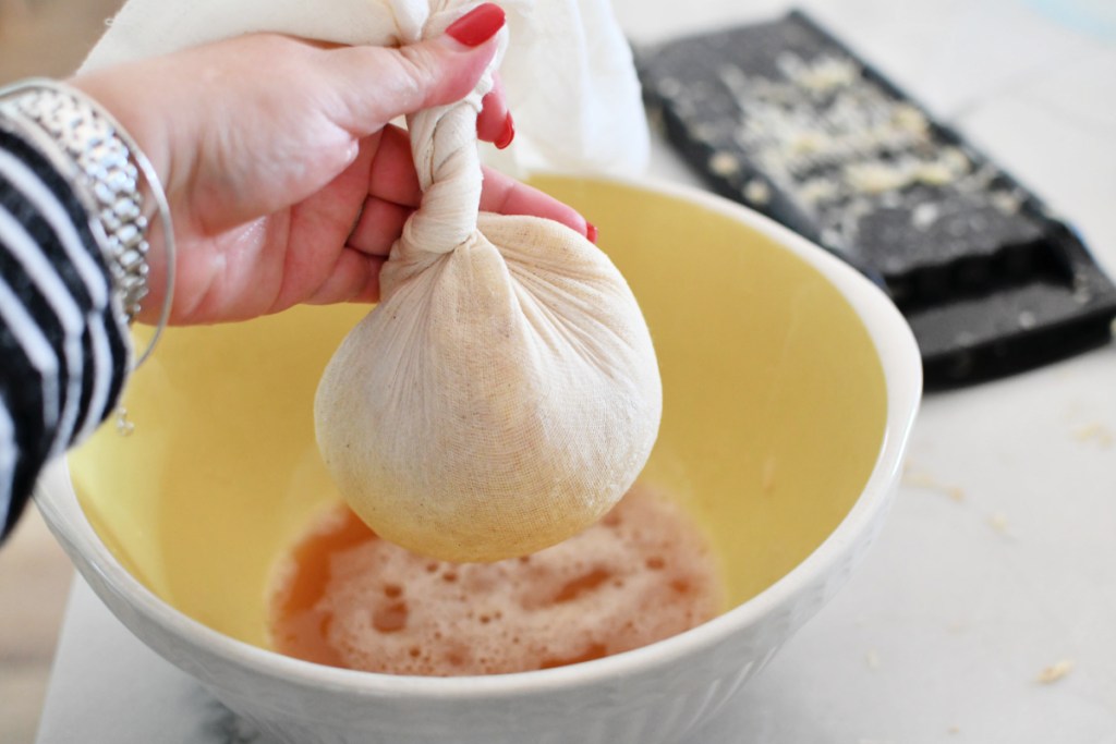 draining liquid from potatoes in a cheesecloth