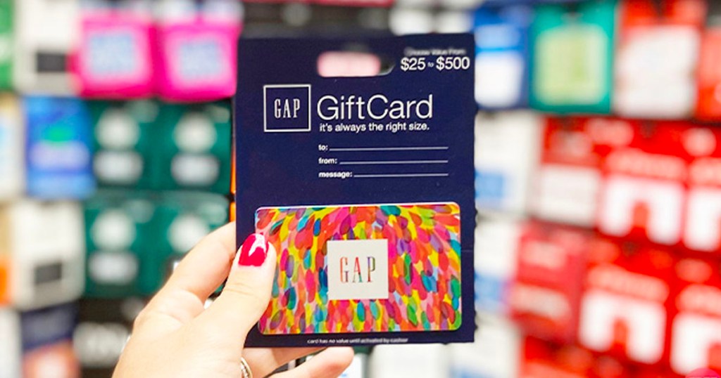 hand holding a gap gift card