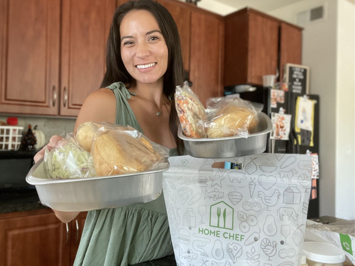 woman holding Home Chef bags