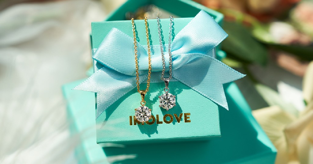 necklaces on blue gift box