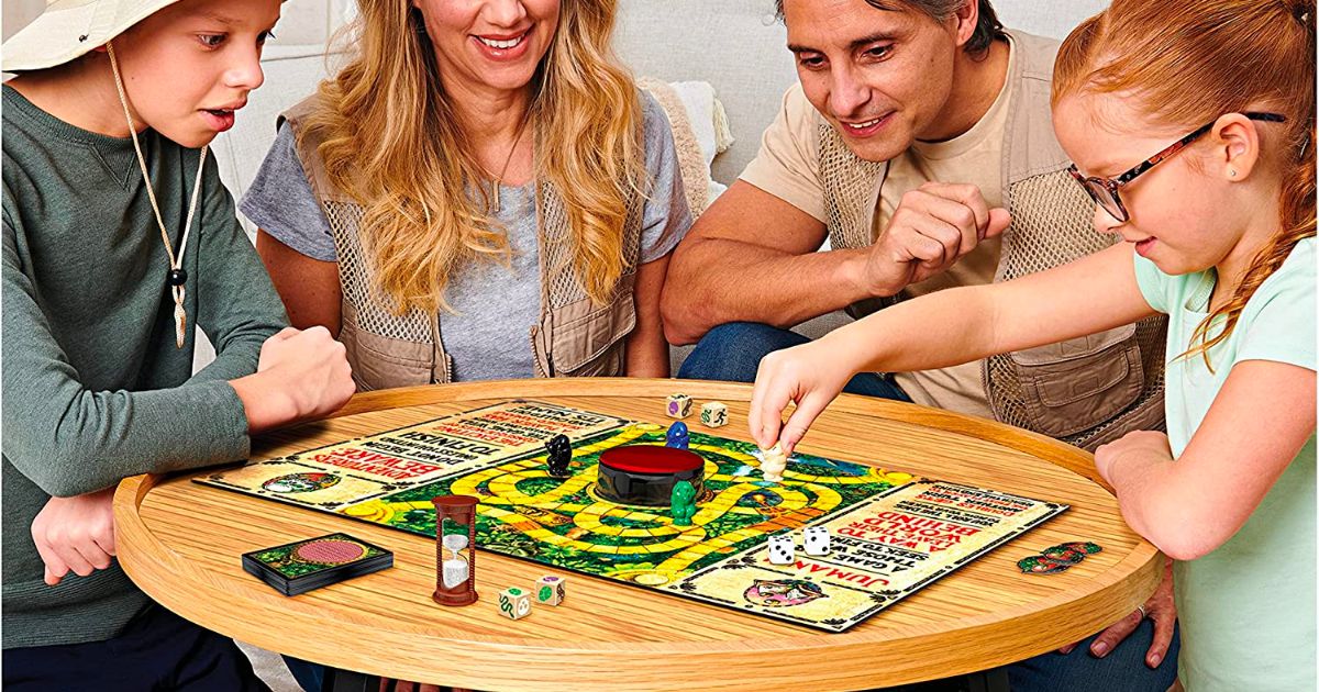 a family of four playing the jumanji board game