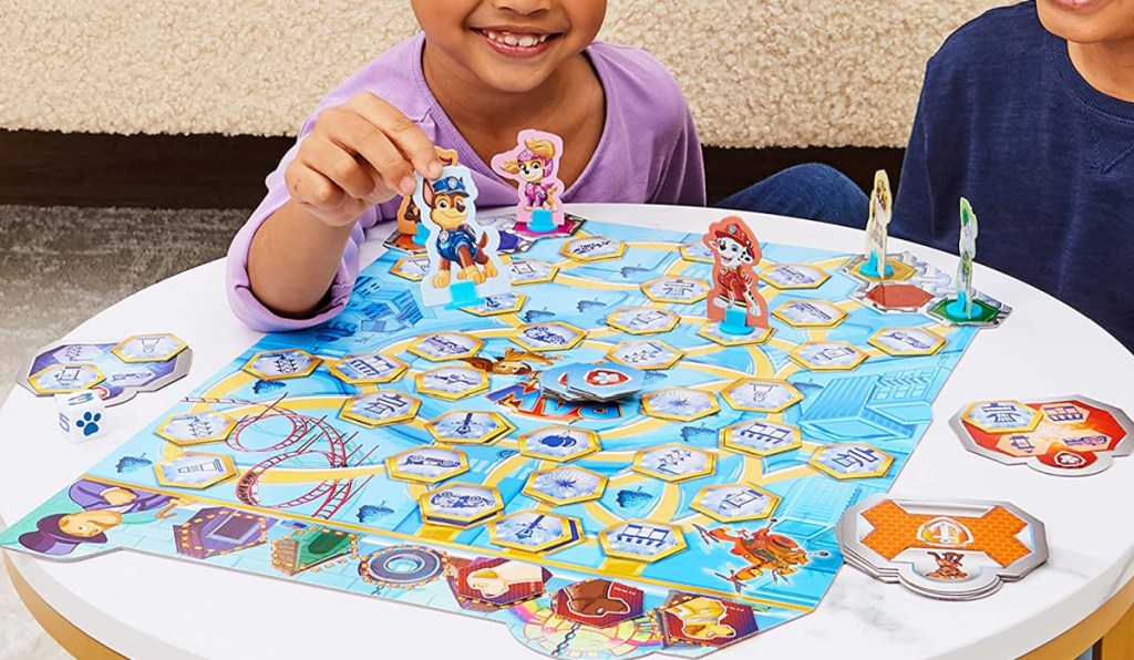 kids playing Paw Patrol The Movie 4-Game Adventure City Pack games with a friend