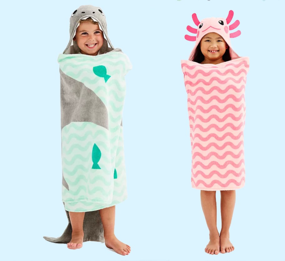 kid in hooded towels