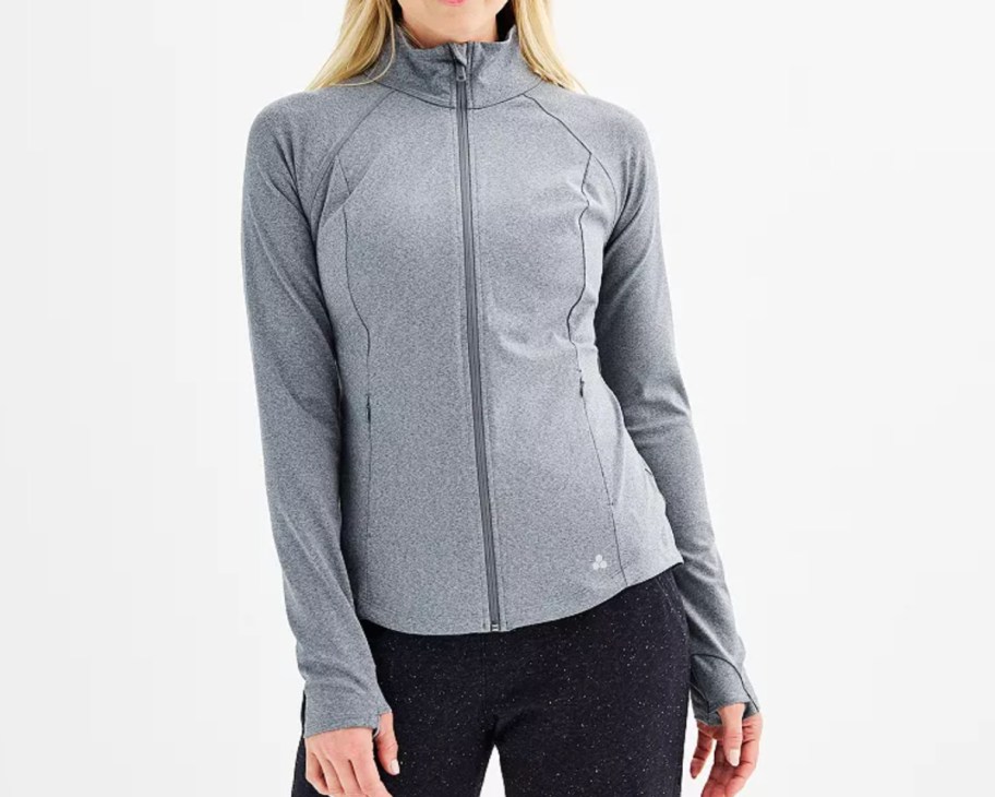 woman in grey zip jacket