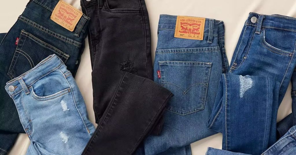 5 pair of levis jeans in various washes from light blue to black