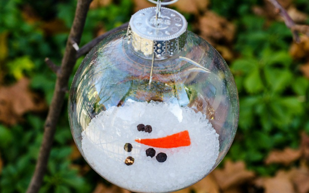 a melted snowman ornament which is one of our clear Christmas ornaments diy projects