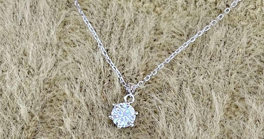 moissanite necklace on blanket 