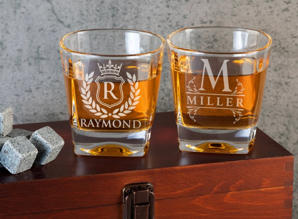two clear personalized whiskey glasses sitting on wood box coolest things on etsy