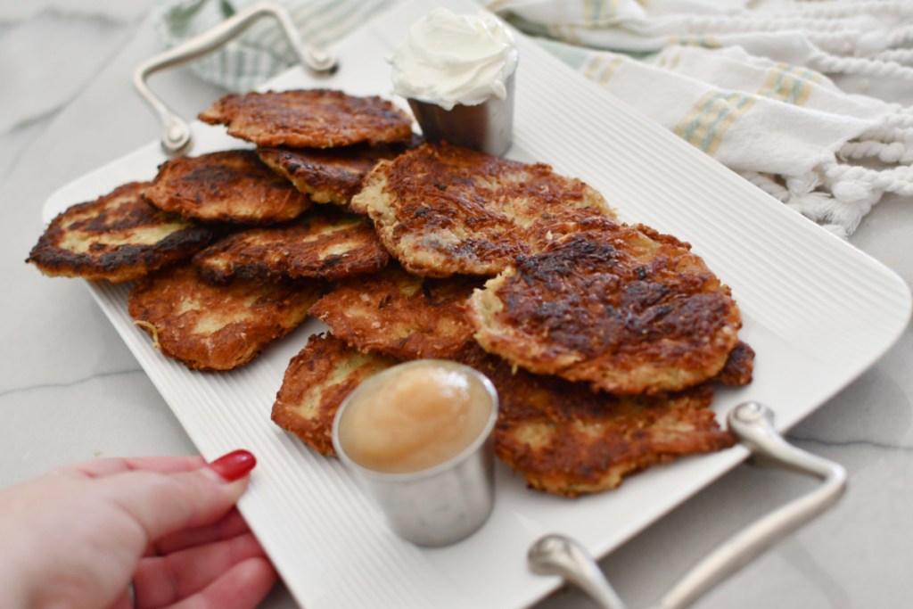 plate with 12 potato latkes