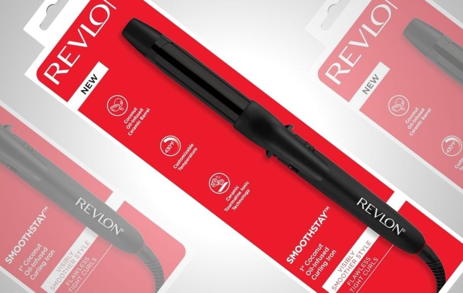 a a red white and black curling iron box stock image