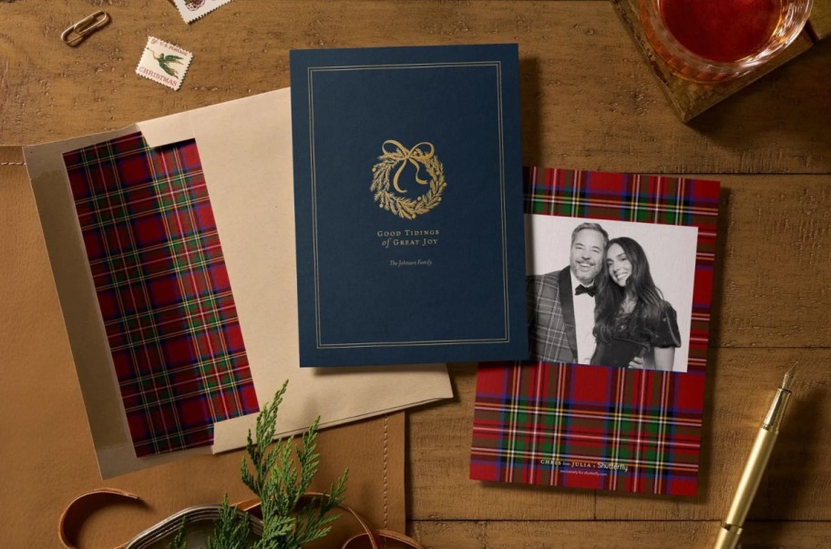 plaid christmas card on a wooden table