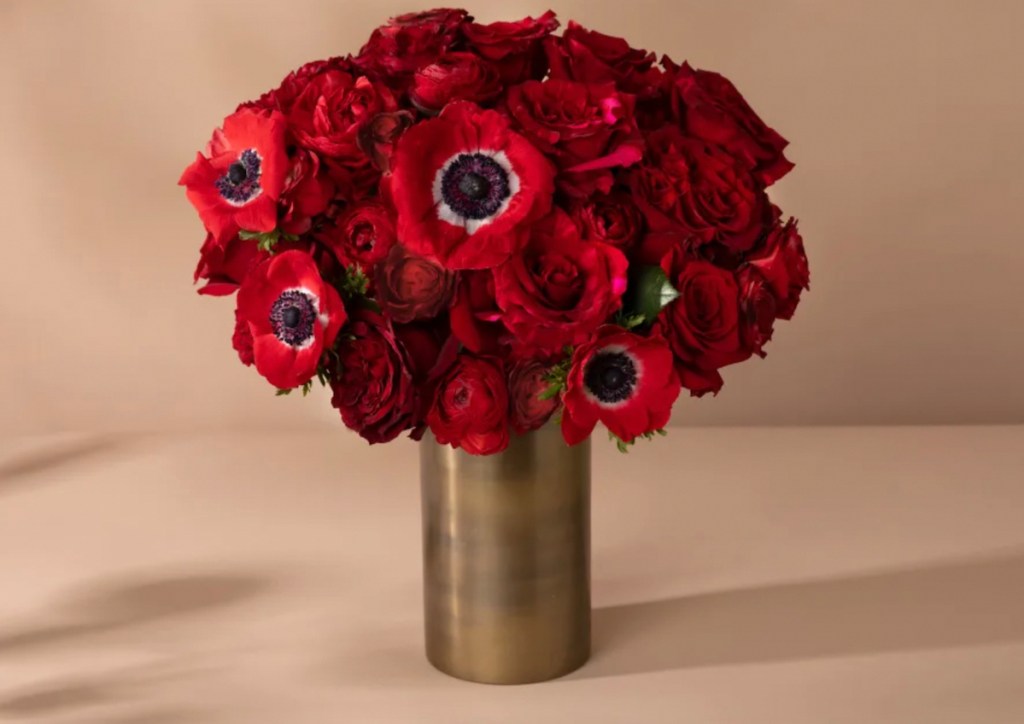 various types of red flowers in gold cheap flower delivery vase