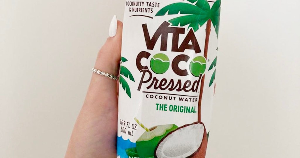 hand holding vita coconut water