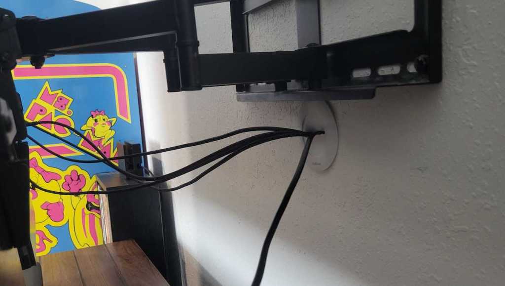 white core hider on wall under tv mount