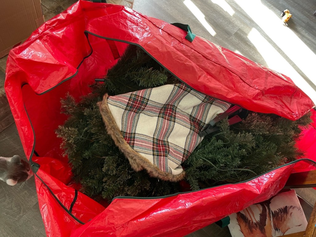 Christmas decorations inside a large red bag