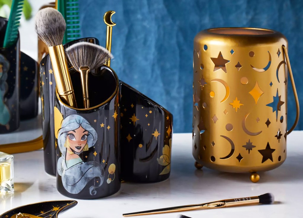 aladdin makeup brush holder and gold candle holder